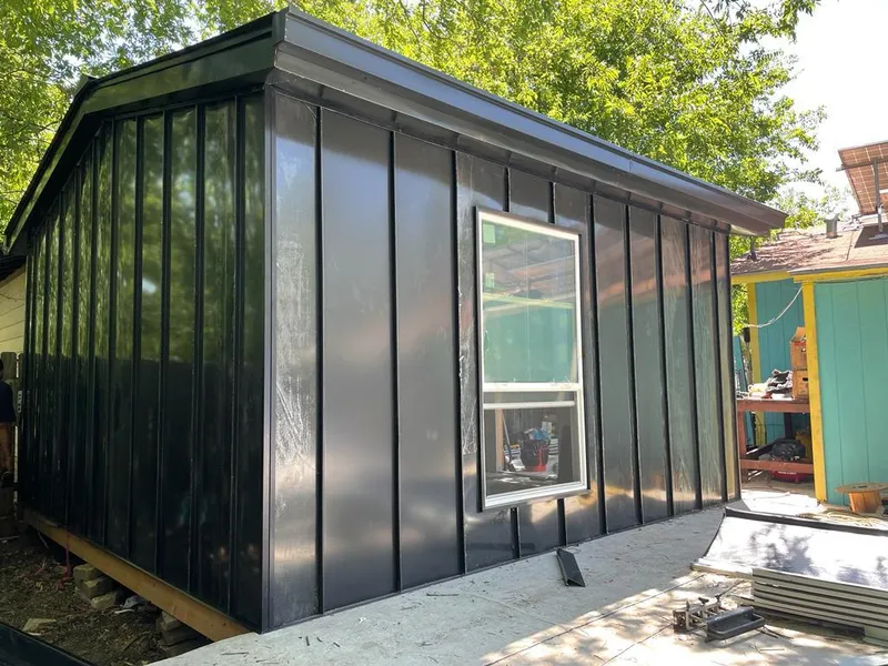 Black standing seam metal wall panels for Metal Roof Installation in Titusville